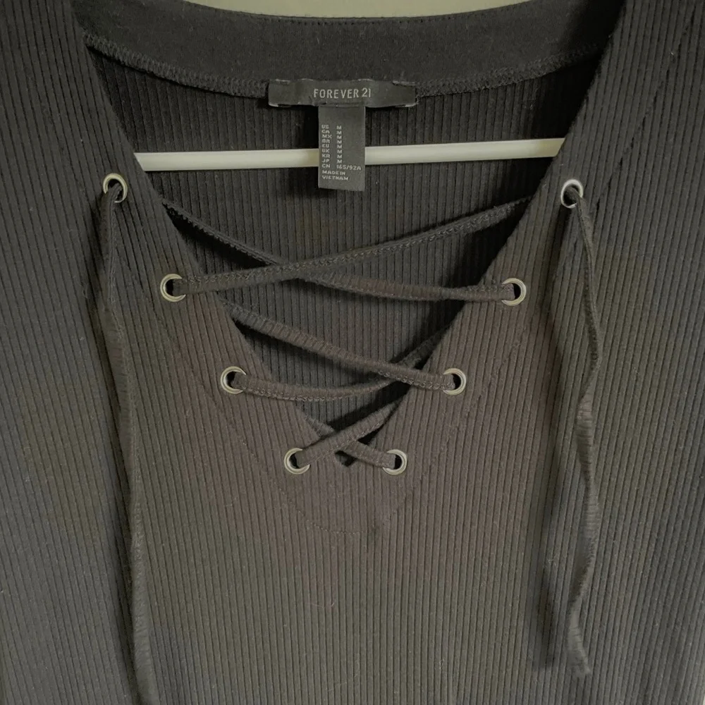 Lace up black ribbed short sleeve bodycon mini dress - Picture 4 of 4
